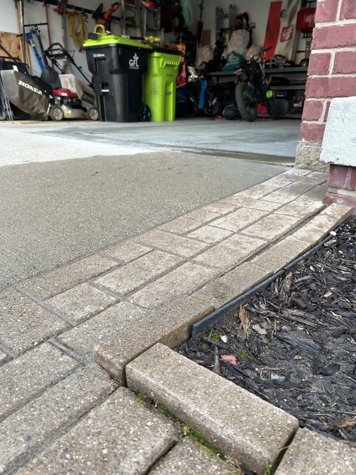 New edge restraint installed, perimeter locked in place